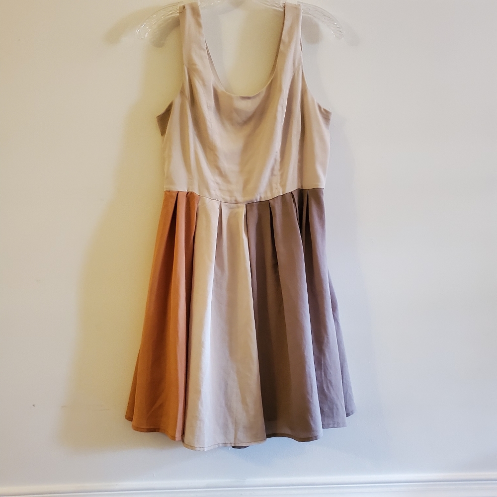 Sleeveless mini flare dress.